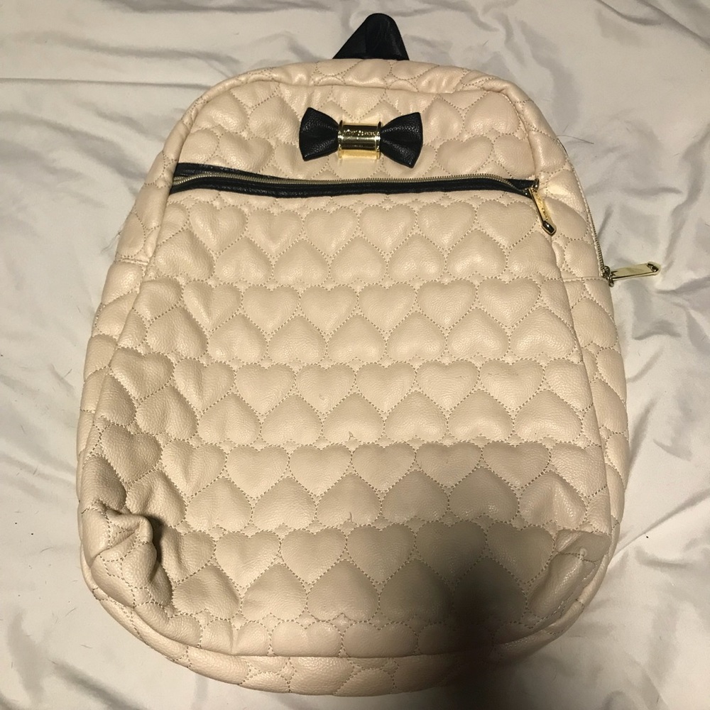 Betsy Johnson cream backpack